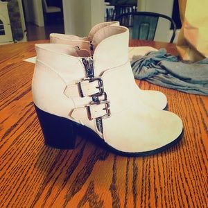 Zipper Pale Pink Booties to edge up any outfit!